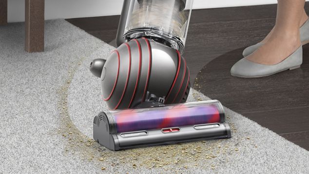 Demonstrating how the Dyson Ball™ glides around the floors on its ball.